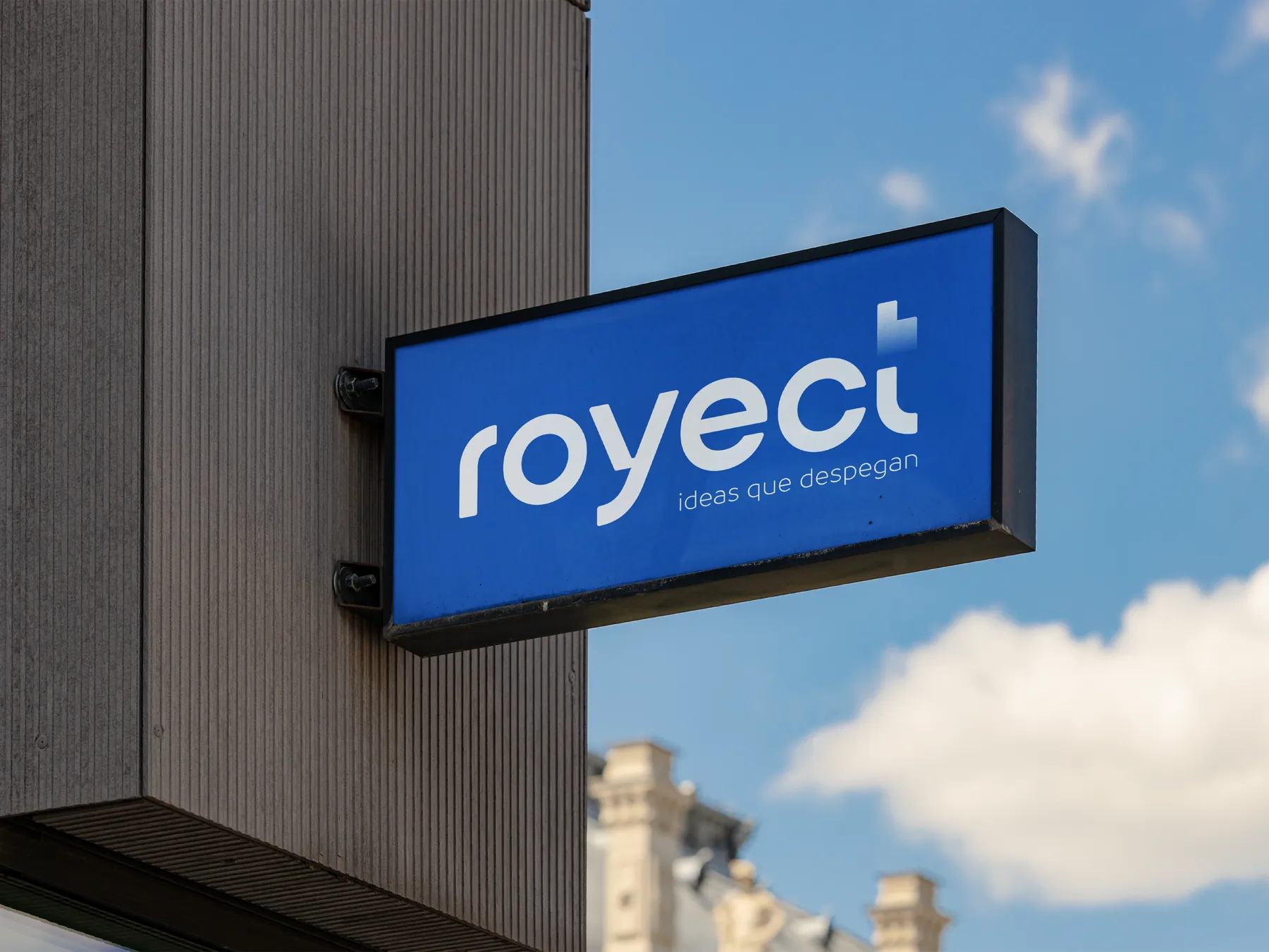 Rótulo luminoso de Royect en la fachada de una oficina